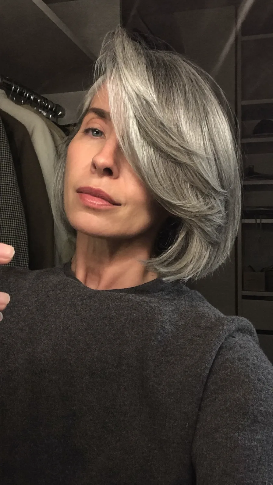 Chic Chin-Length Layered Silver Gray Hair with Side-Swept Bangs