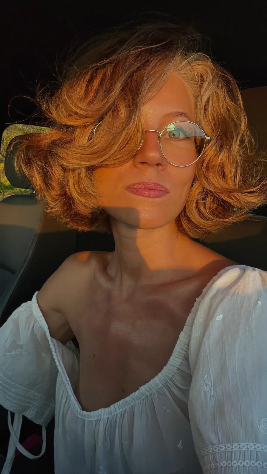 Voluminous Layered Chin-Length Bob with Warm Honey Blonde Color