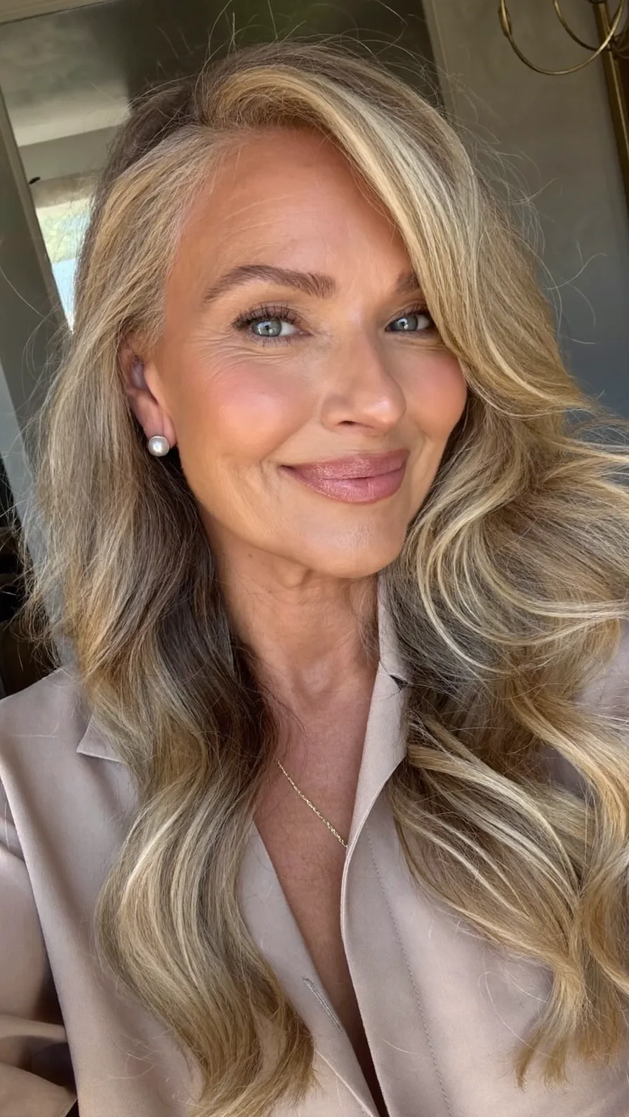 Elegant Long Layered Waves with Soft Side-Swept Blonde Highlights