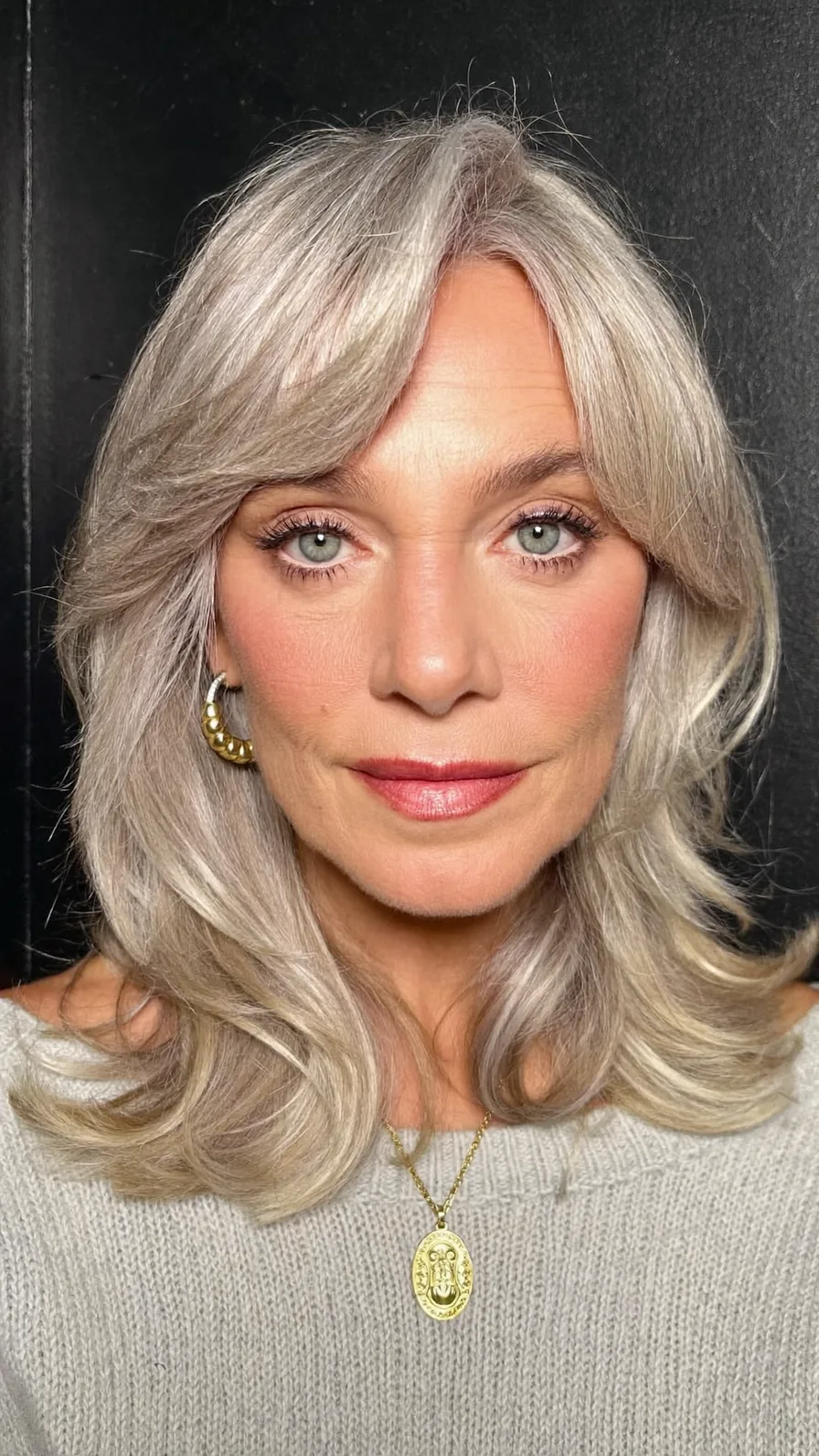 Soft Feathered Long Layers with Center Curtain Bangs