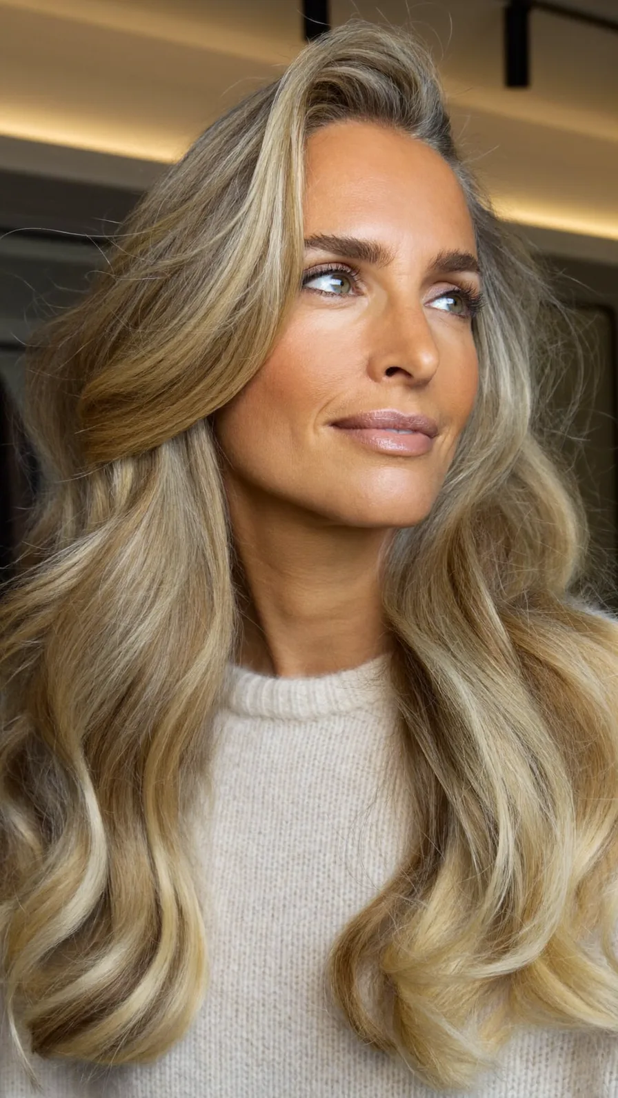 Elegant Voluminous Long Layers with Soft Side-Swept Waves