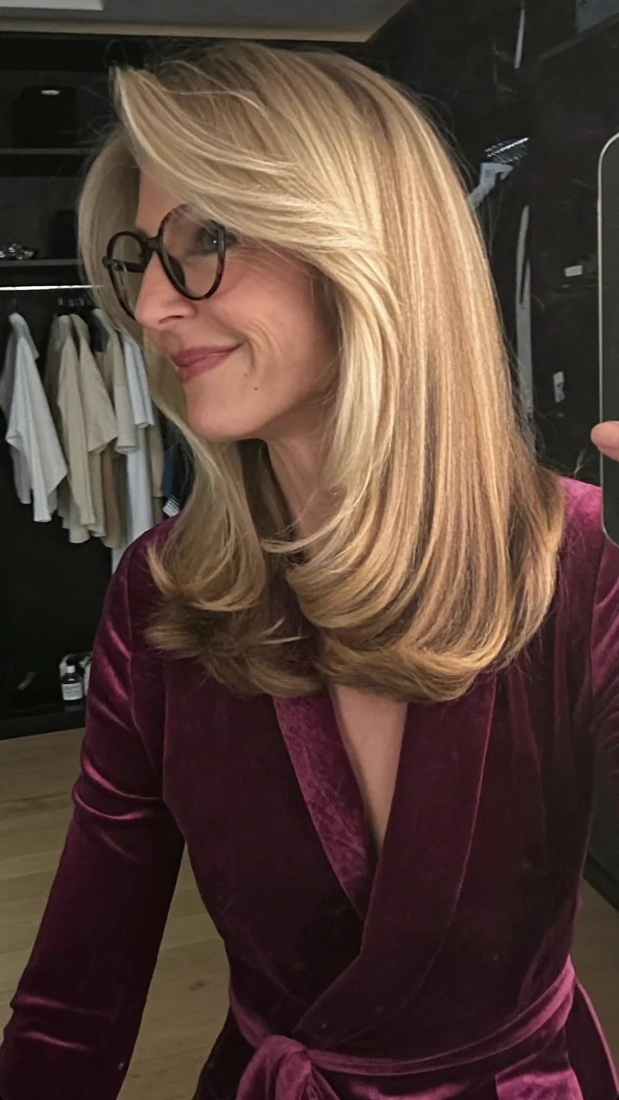 Classic Feathered Medium Length Hair with Warm Blonde Highlights