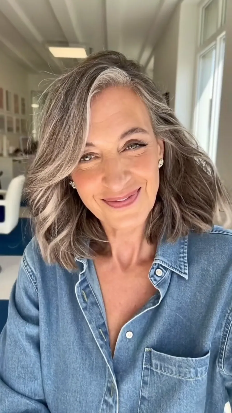 Sophisticated Shoulder-Length Salt and Pepper Layered Hairstyle