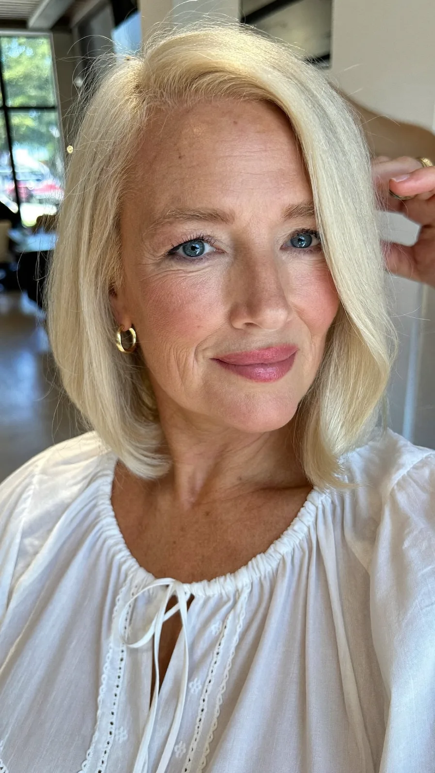 Classic Rounded Chin-Length Platinum Blonde Bob Hairstyle