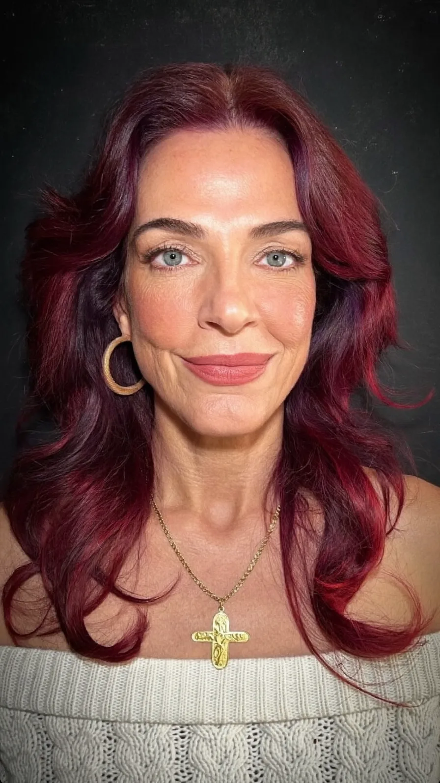 Voluminous Burgundy Wavy Layers with Feathered Curtain Bangs