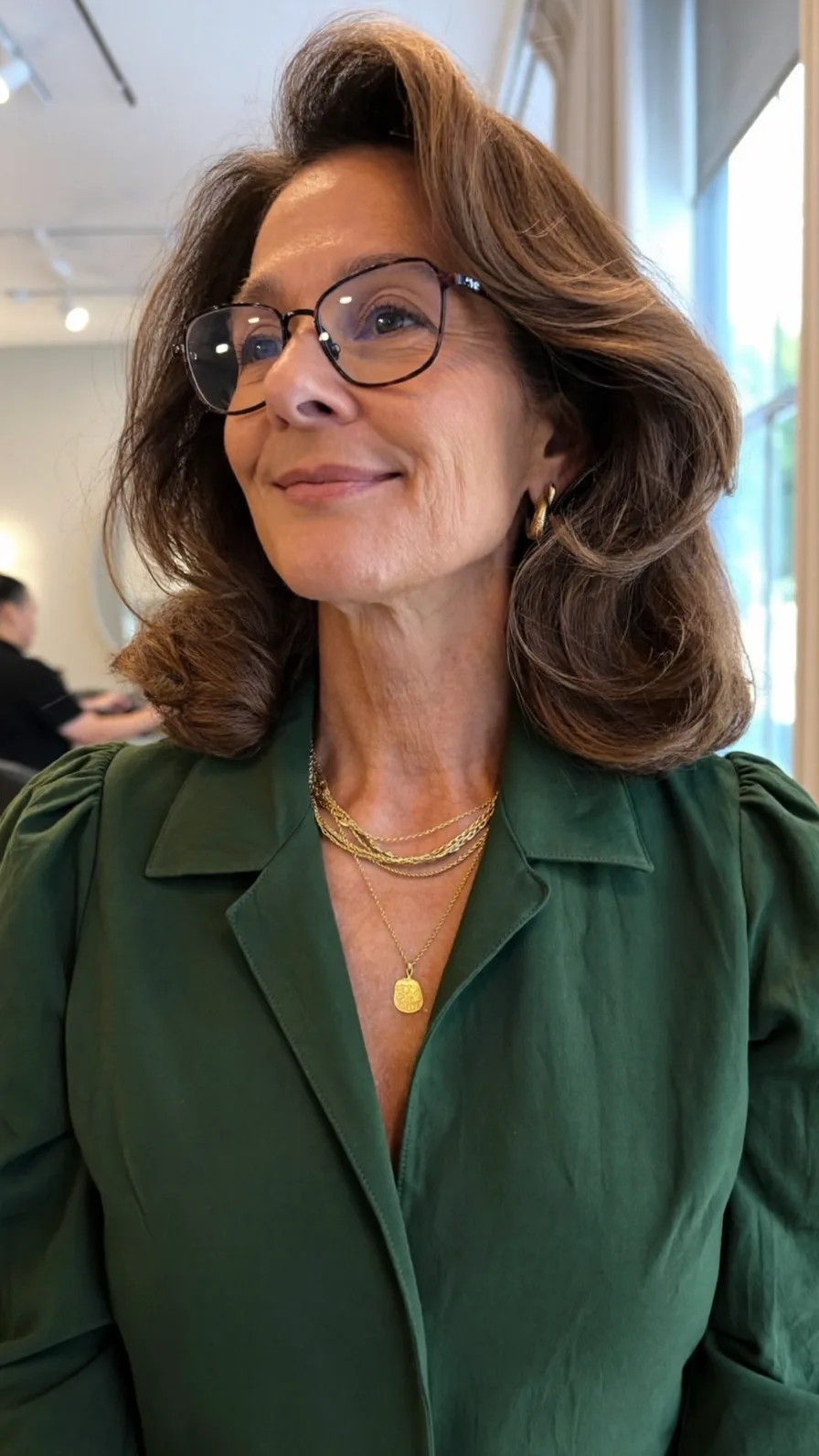 Voluminous Shoulder-Length Long Layers with Side-Swept Bangs