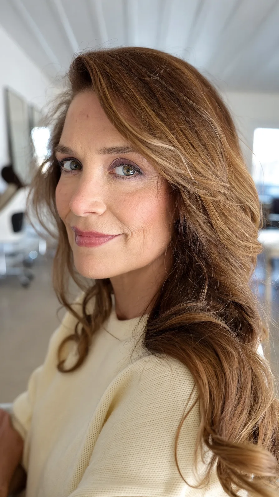 Elegant Long Layers with Side-Swept Wavy Highlights