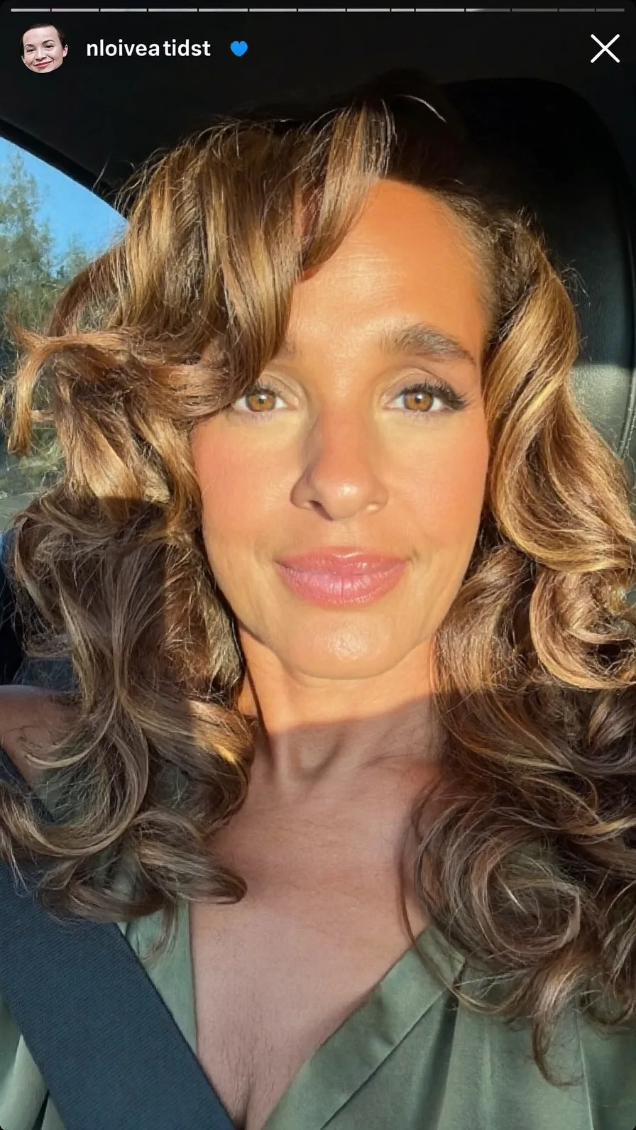 Voluminous Long Layers with Side-Swept Warm Honey Highlights