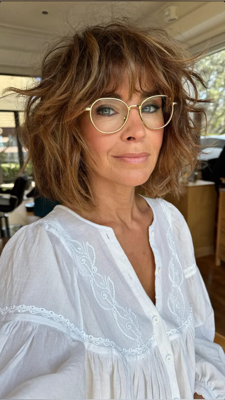 Voluminous Textured Choppy Bob with Wispy Caramel Highlights