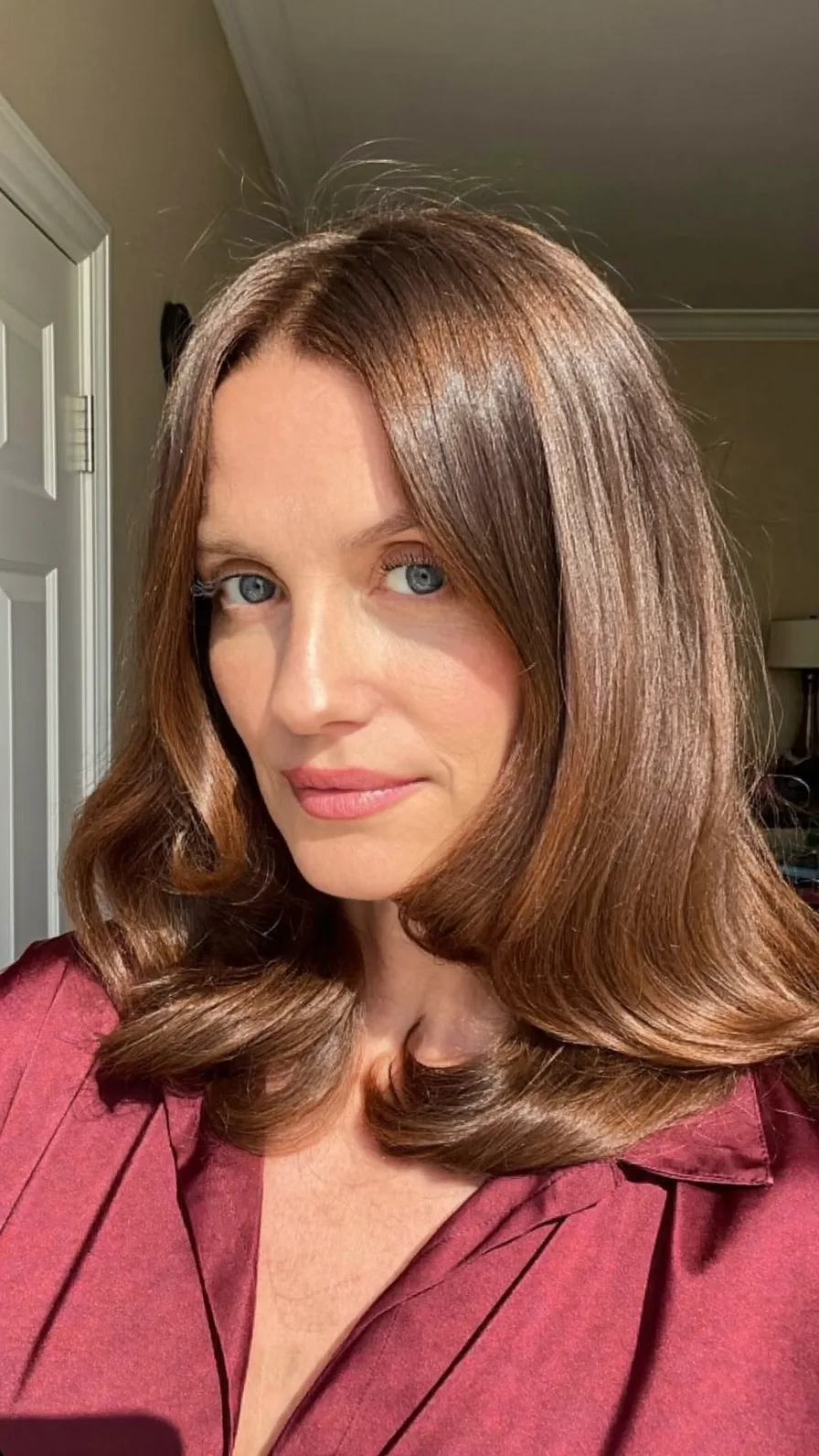 Classic Medium Length Layered Hairstyle with Center Part