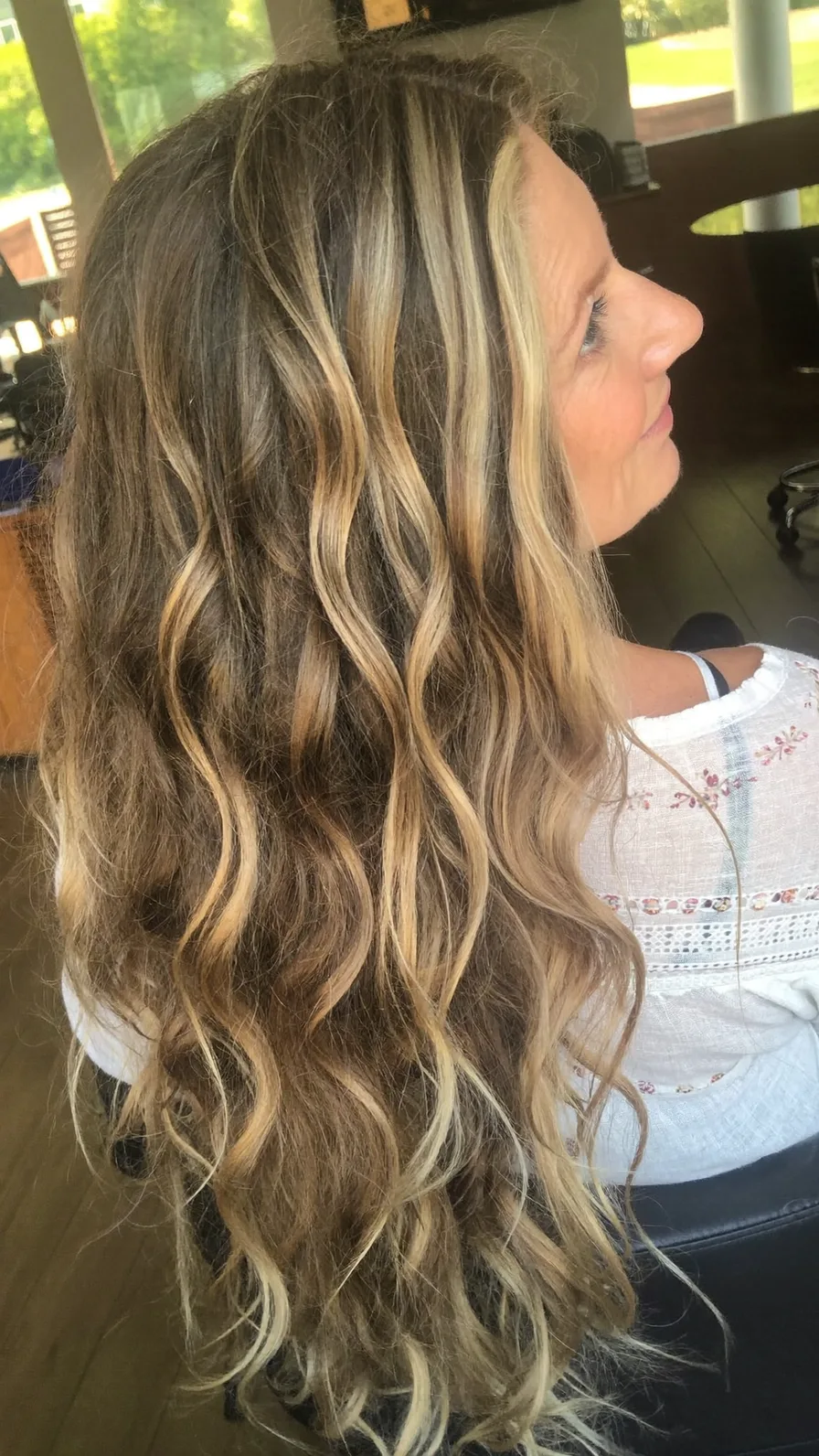 Voluminous Wavy Long Layers with Warm Honey Blonde Balayage