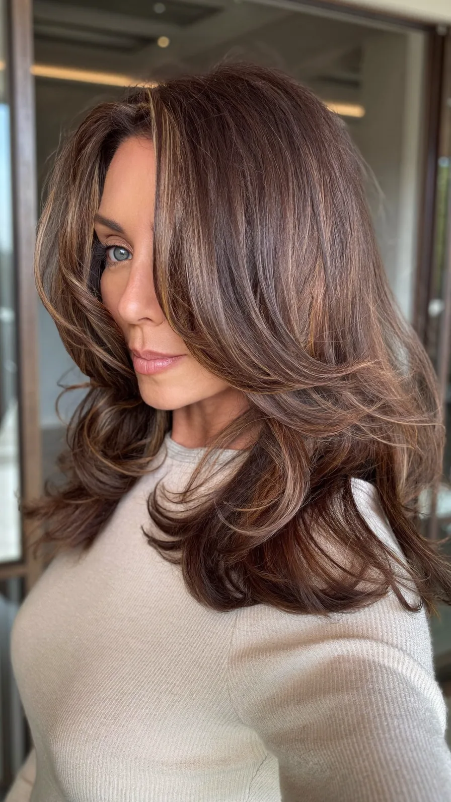Voluminous Shoulder-Length Long Layers with Caramel Balayage Highlights