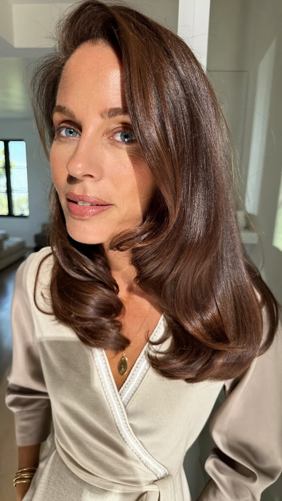 Soft Chestnut Brown Long Layers With Side-Swept Volume