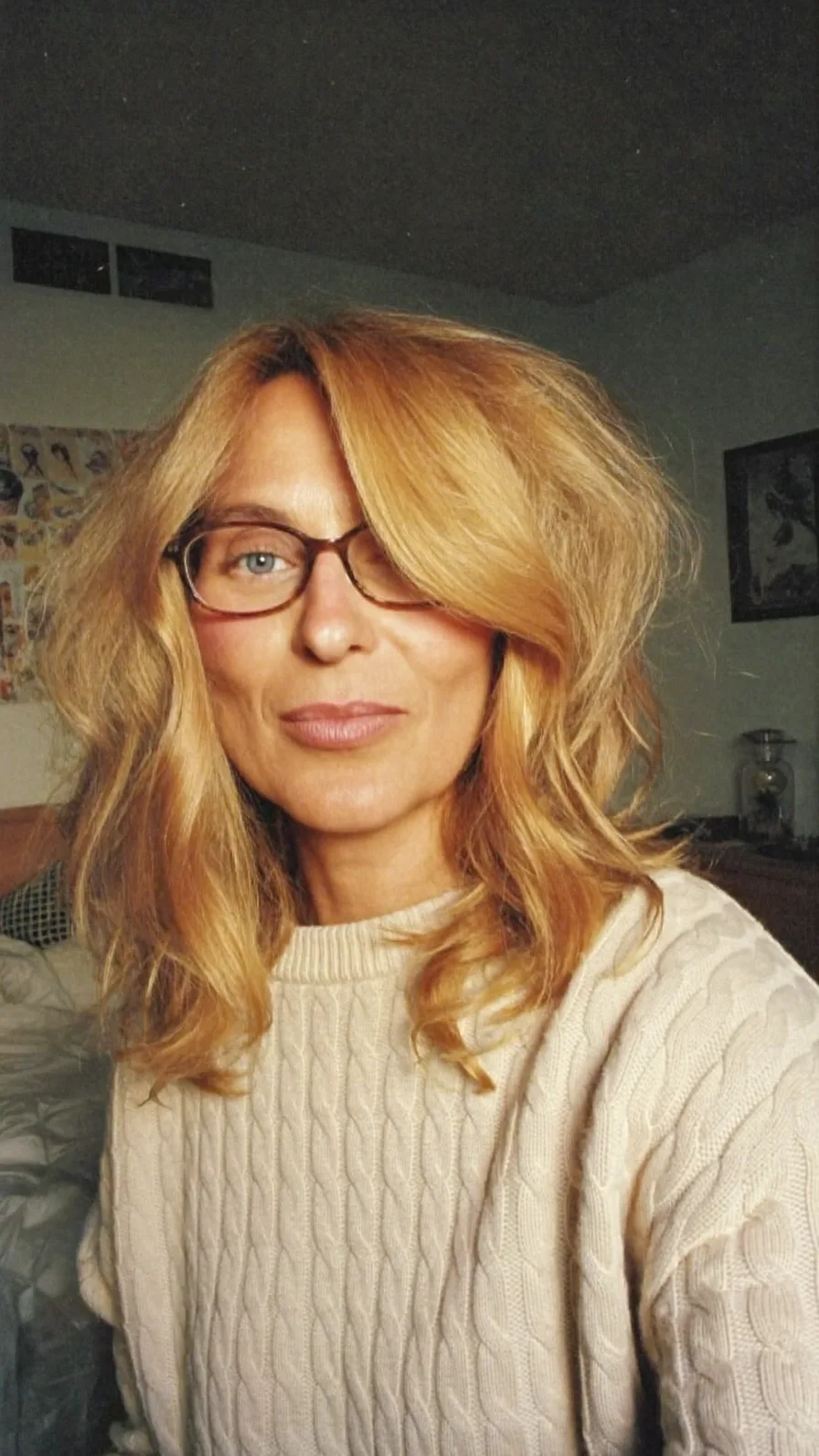 Voluminous Golden Blonde Medium-Length Layered Haircut