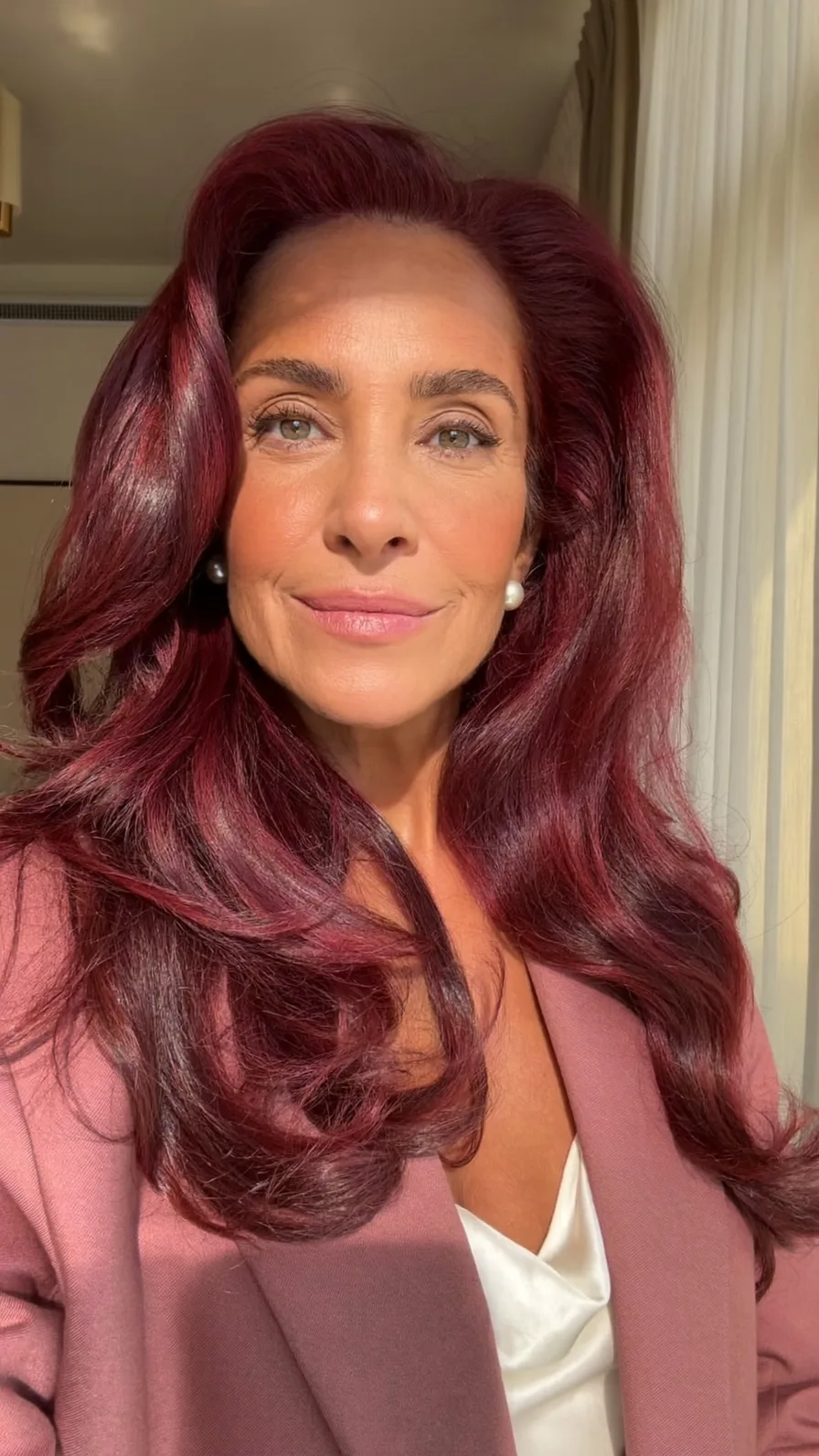Voluminous Wavy Long Layers with Deep Burgundy Shine