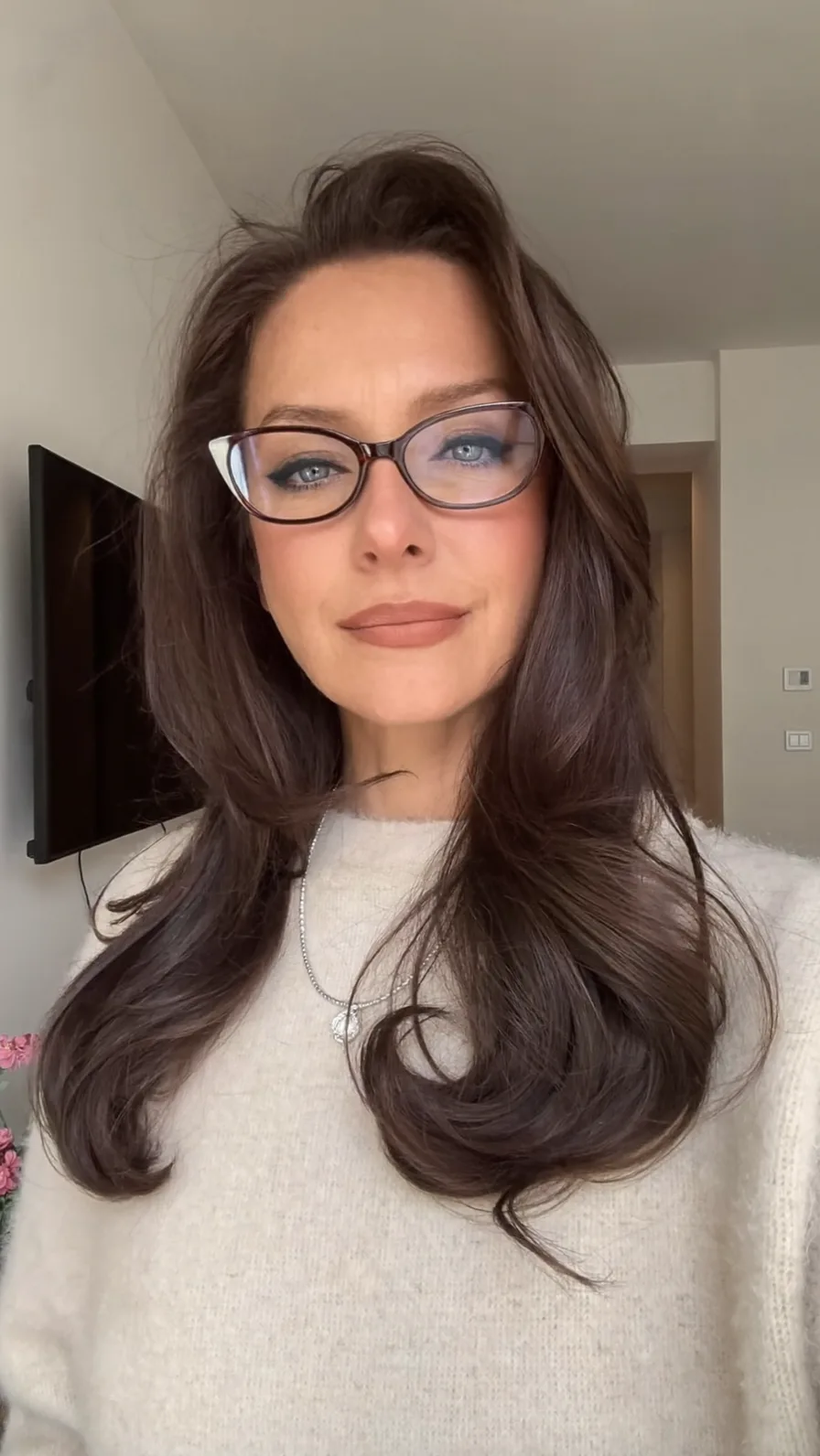 Voluminous Long Layered Hair with Side-Swept Styling