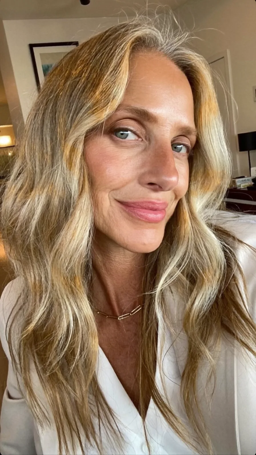 Long Layered Wavy Hair with Warm Honey Blonde Highlights