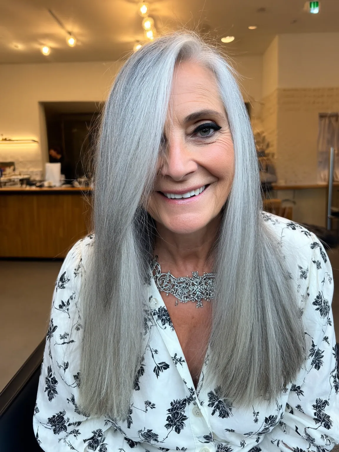 Long Straight Layers with Side-Swept Bangs in Silver Frost