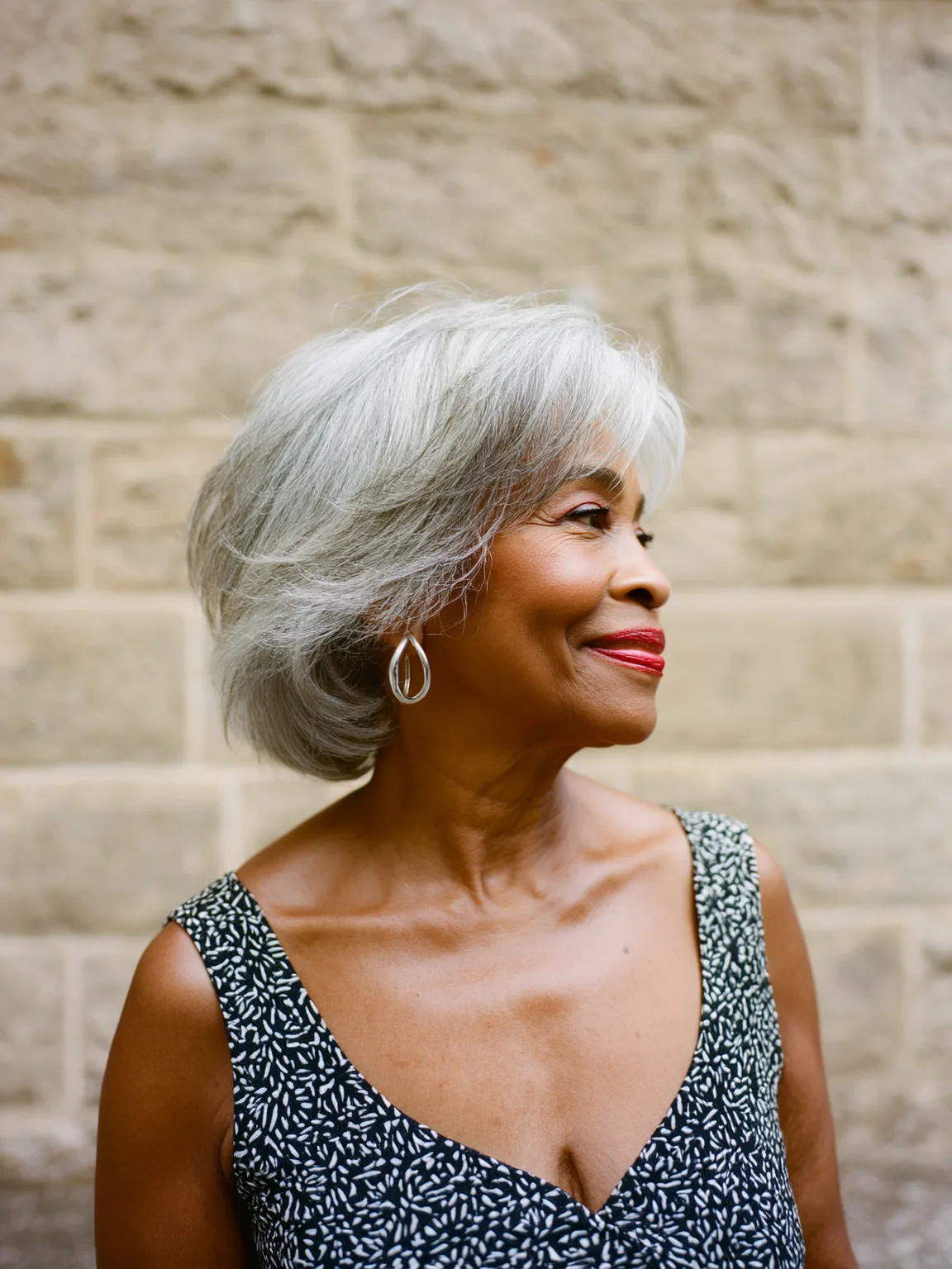 Voluminous Wavy Silver Grey Bob with Side Framing Bangs
