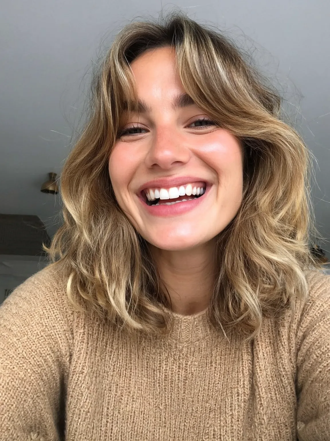 Voluminous Shoulder-Length Lob with Honey Blonde Balayage
