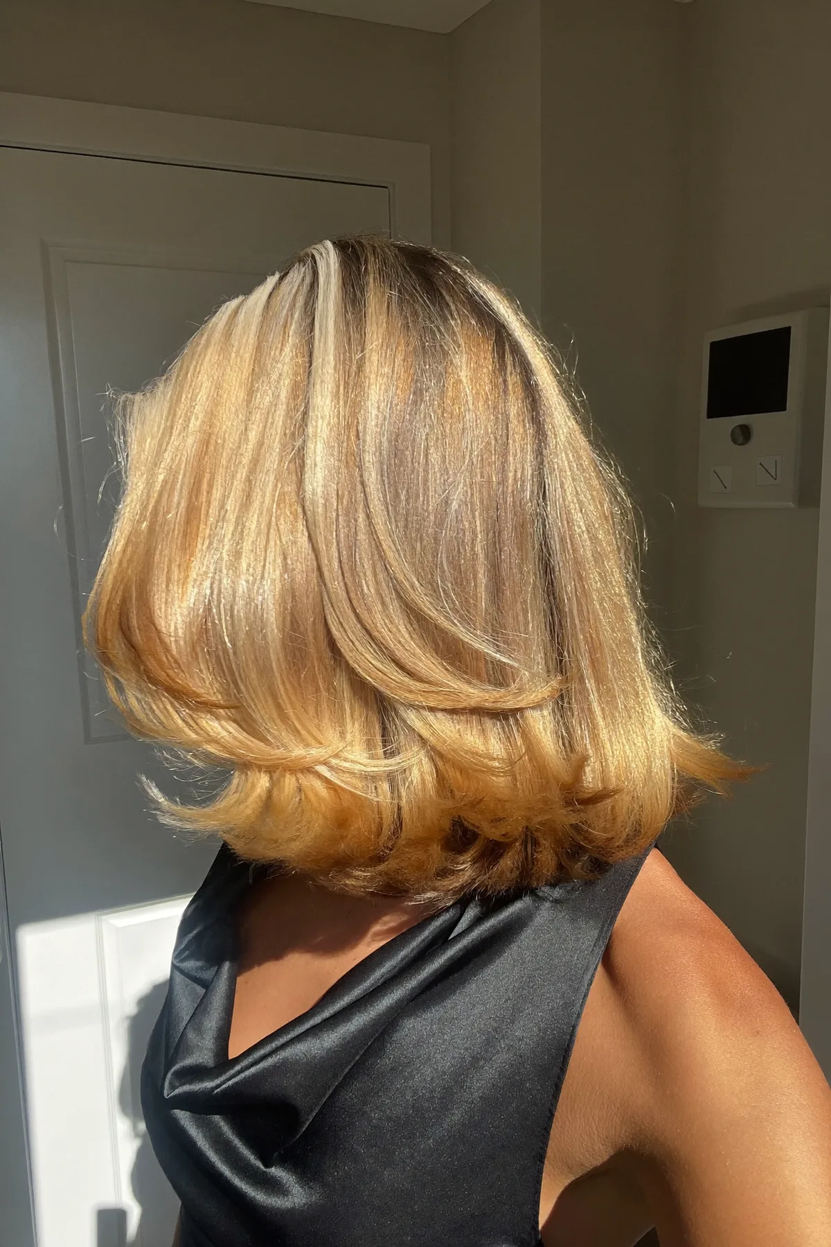 Sleek Straight Honey Golden Blonde Shoulder-Length Bob with Blended Balayage
