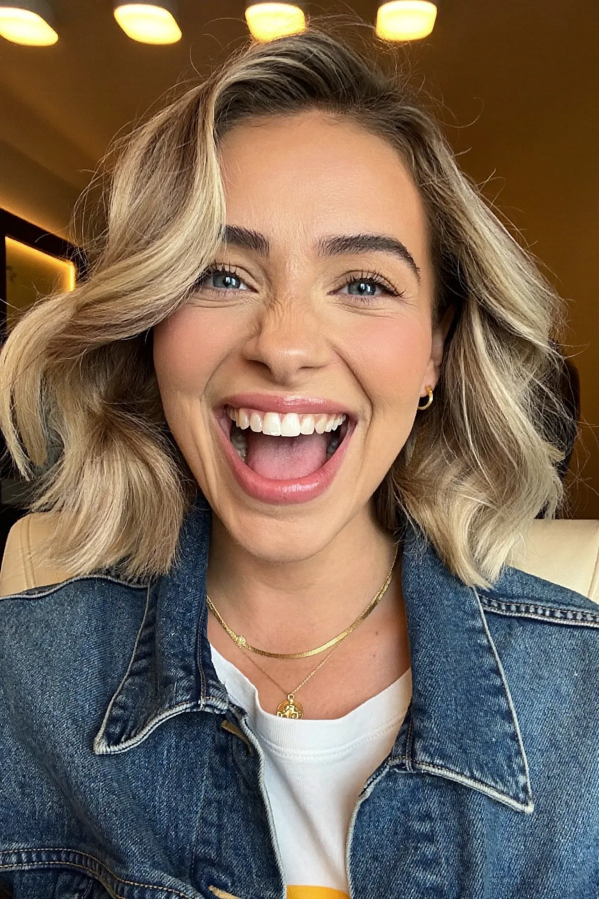 Honey Golden Blonde Chin-Length Wavy Bob with Blended Balayage