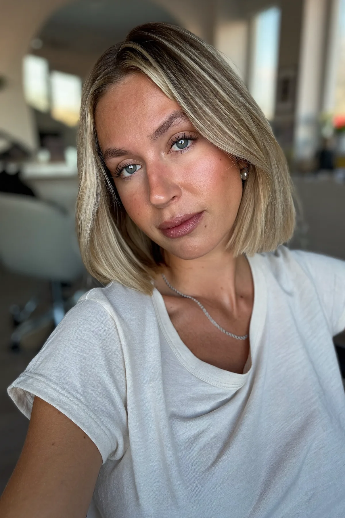 Chin-Length Honey Golden Blonde Bob with Sleek Curtain Bangs