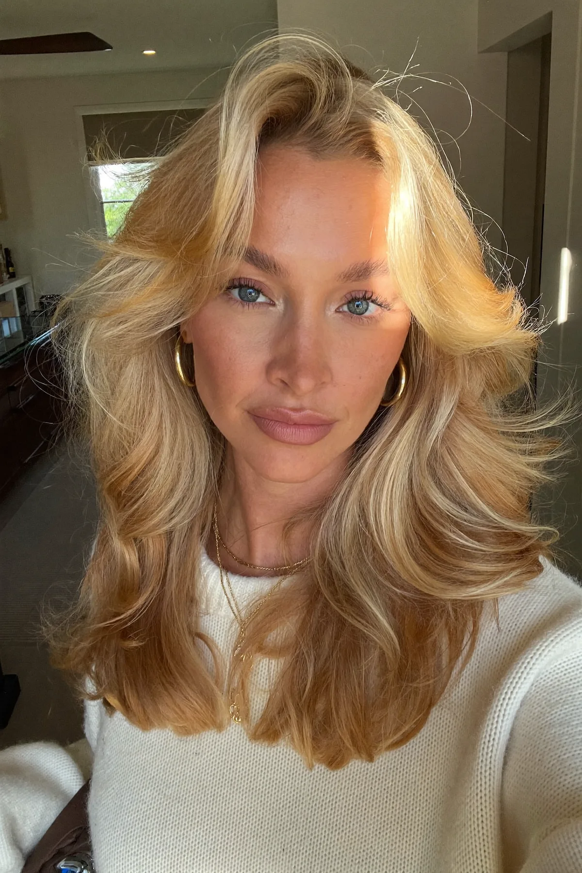 Honey Golden Blonde Collarbone-Length Lob with Wavy Curtain Bangs