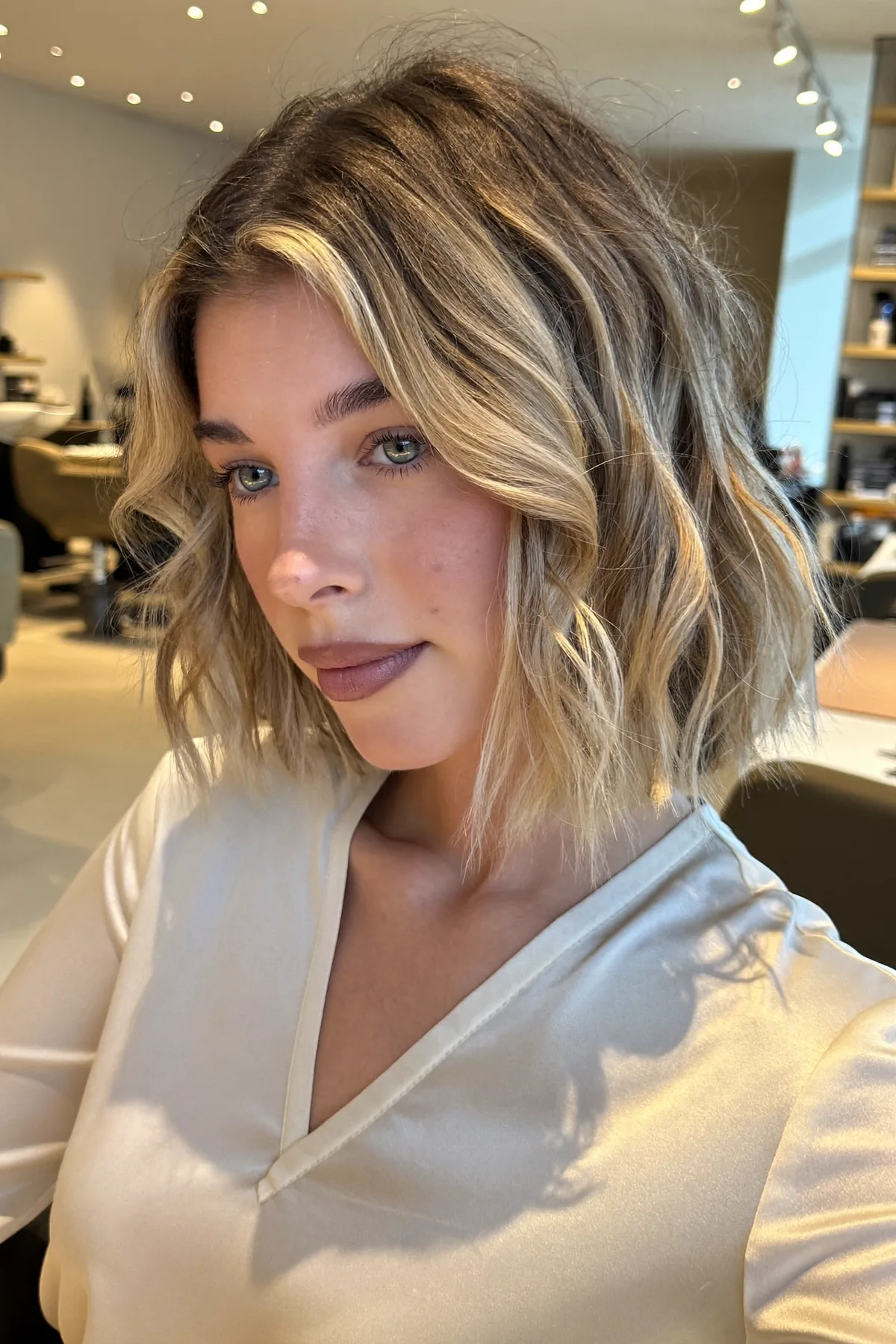 Honey Golden Blonde Chin-Length Wavy Bob with Blended Balayage