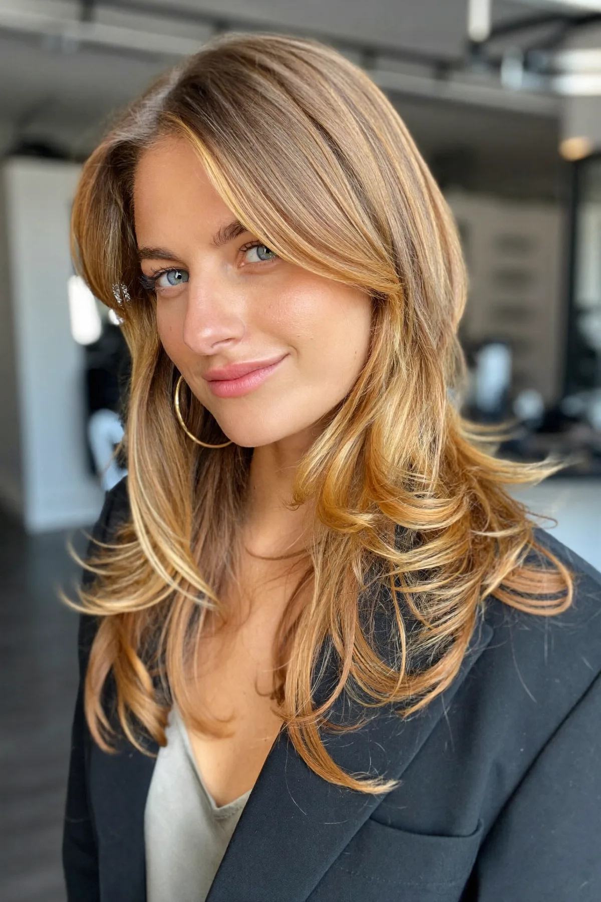 Honey Golden Blonde Long Layered Cut with Curtain Bangs and Balayage
