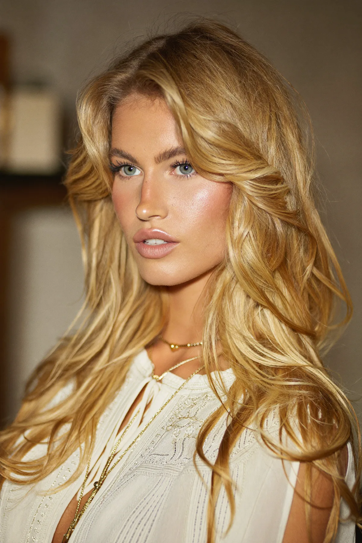 Honey Golden Blonde Long Layered Cut with Blended Balayage Waves