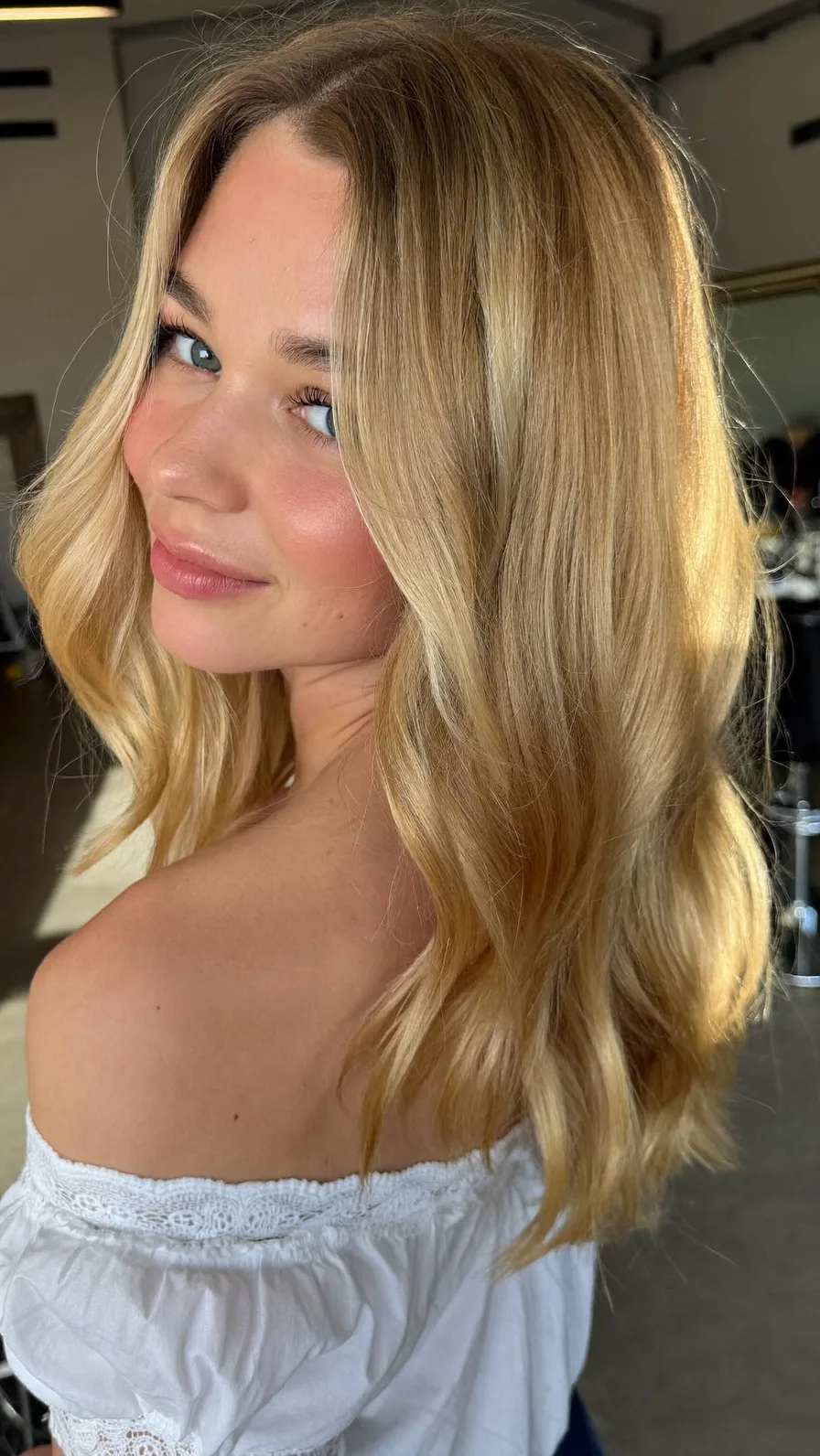 Soft Honey Blonde Long Layers with Flowy Curtain Bangs