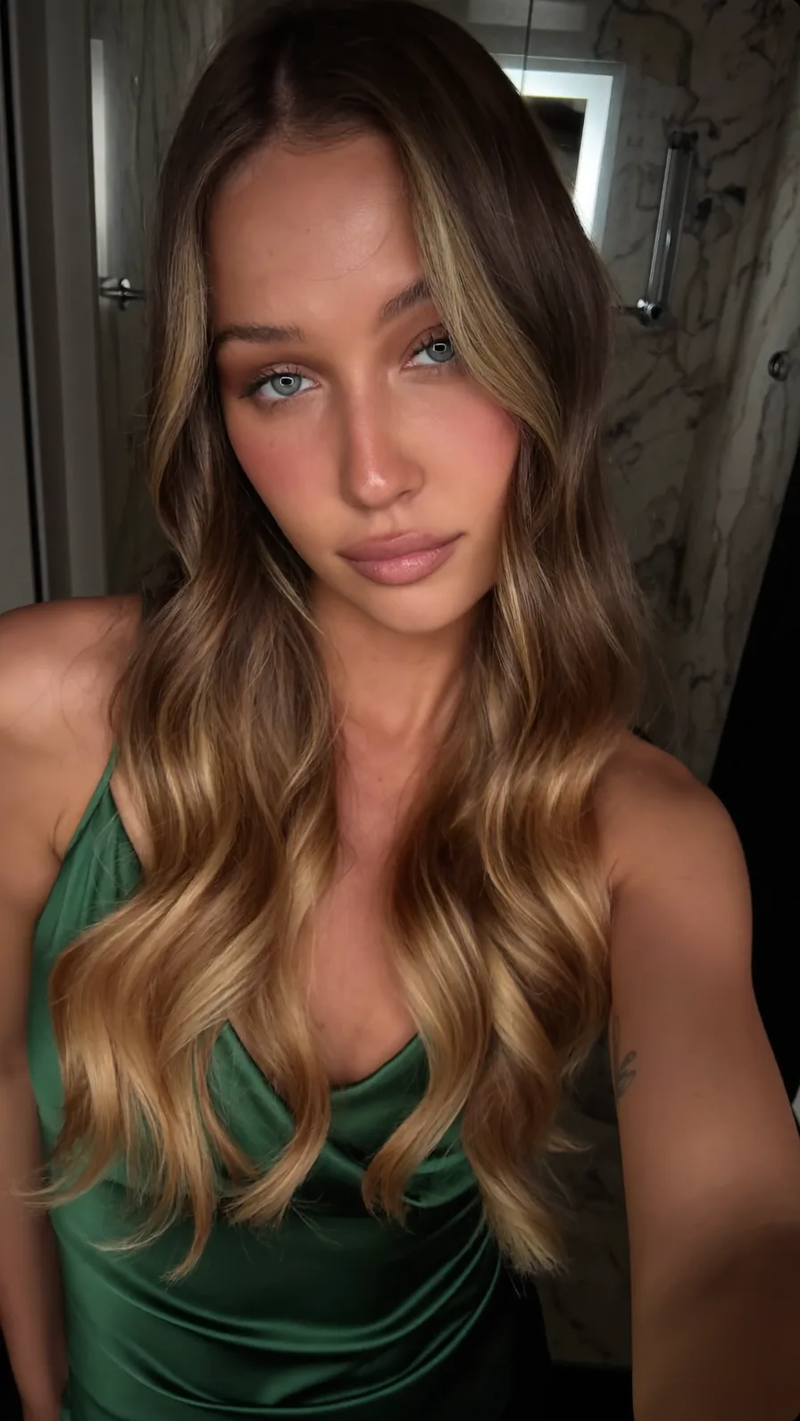 Long Wavy Layers with Honey Blonde Balayage Curtain Bangs