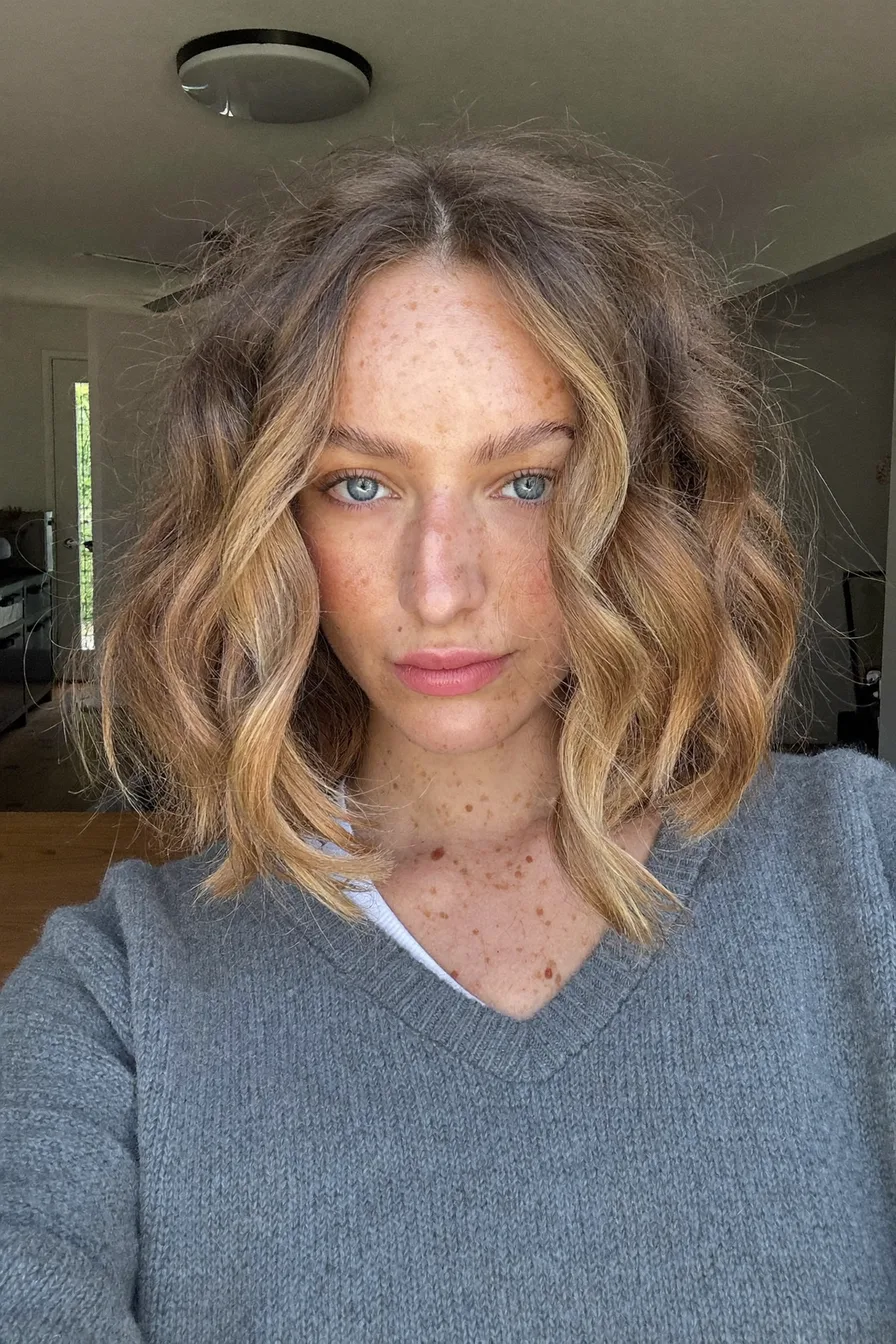 Voluminous Shoulder-Length Lob with Warm Honey Blonde Balayage