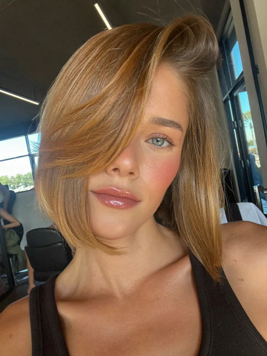 Modern Warm Honey Blonde Lob with Side-Swept Bangs