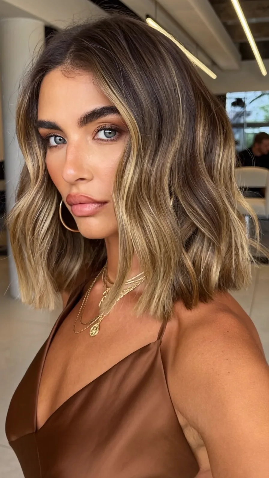 Modern Blunt Lob with Honey Balayage and Soft Waves