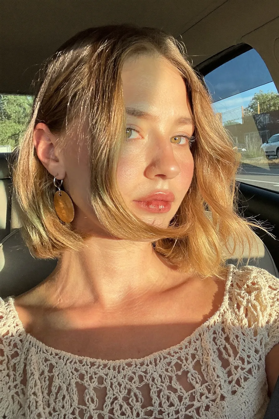 Golden Honey Blonde Soft Wavy Lob with Curtain Bangs