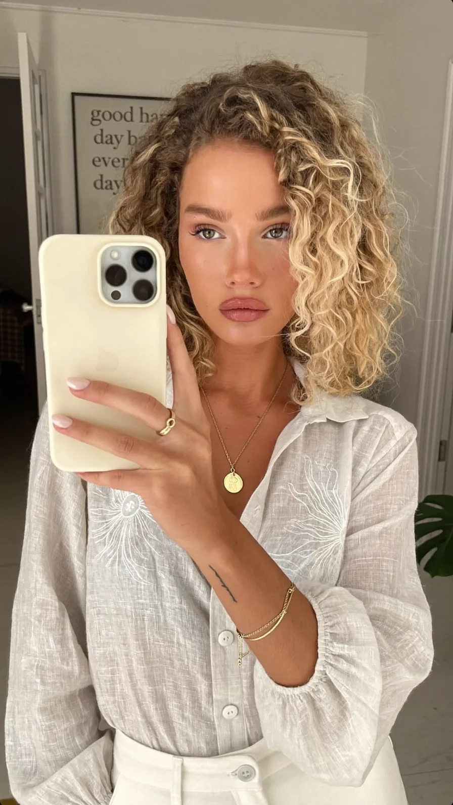 Voluminous Shoulder-Length Curly Lob with Honey Blonde Balayage