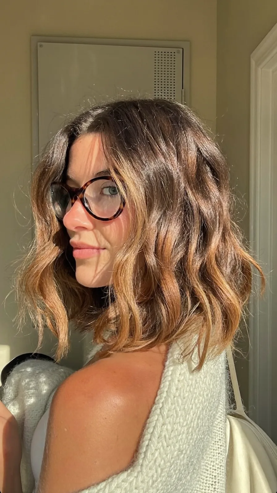 Soft Wavy Lob with Caramel Balayage and Curtain Bangs