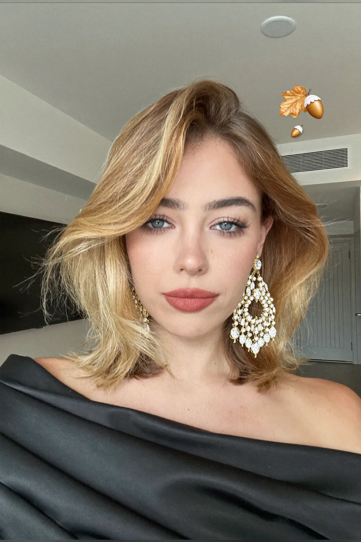 Honey Golden Blonde Lob with Wavy Texture and Curtain Bangs