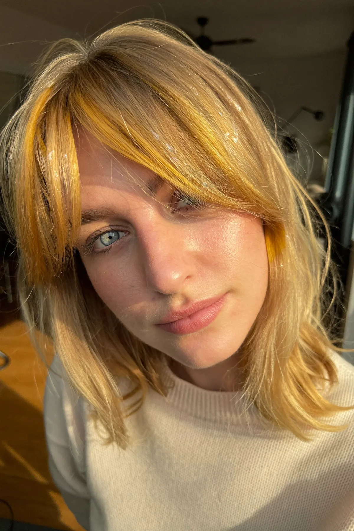 Honey Golden Blonde Long Bob with Curtain Bangs and Money-Piece Highlights