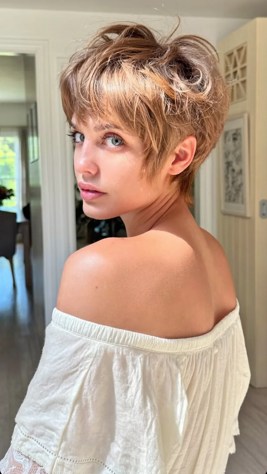 Modern Textured Pixie Cut with Warm Honey Blonde Tones
