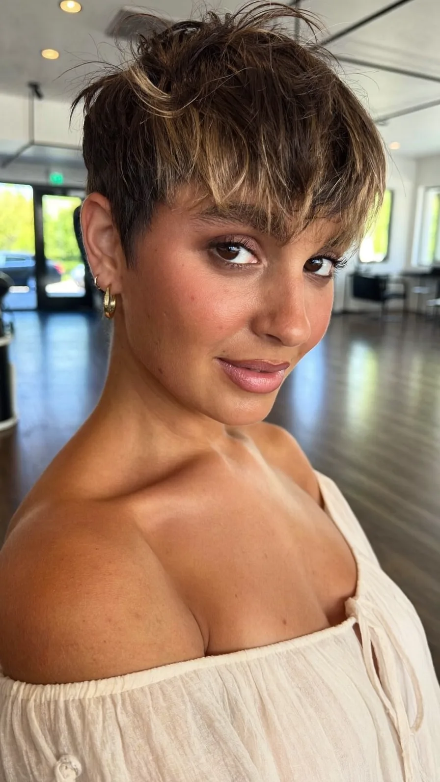 Modern Textured Pixie with Honey Blonde Balayage Highlights