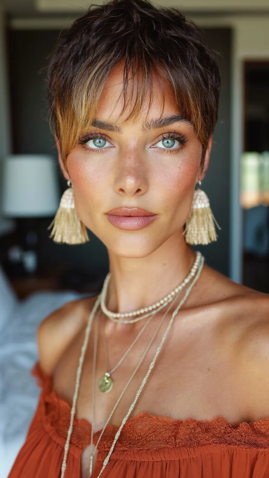 Textured Pixie Cut with Warm Honey Blonde Balayage Highlights
