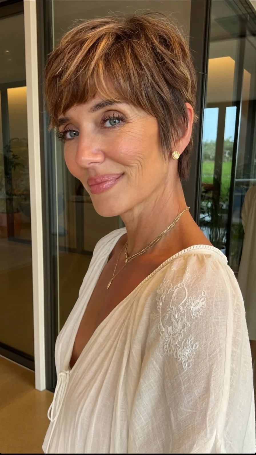 Textured Short Pixie Cut with Warm Honey Highlights