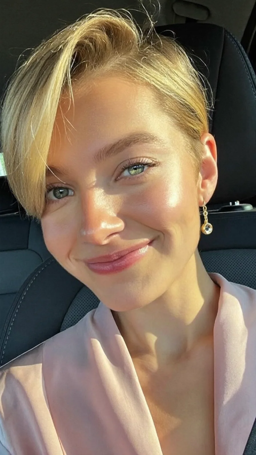 Short Honey Blonde Pixie Cut with Side-Swept Long Fringe