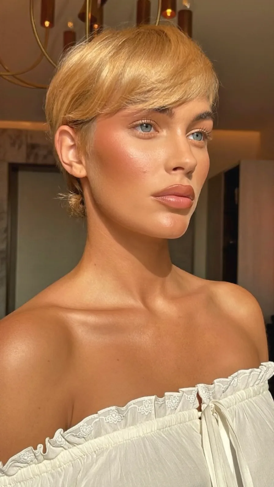 Modern Short Pixie Cut with Side Swept Soft Bangs