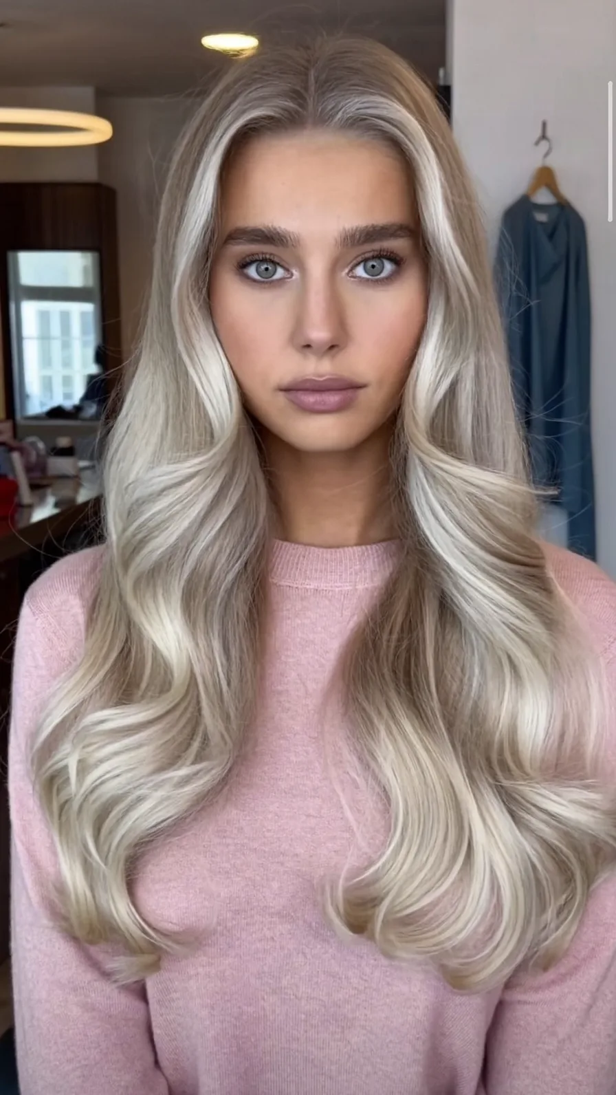 Voluminous Cool Platinum Blonde Long Layered Hairstyle