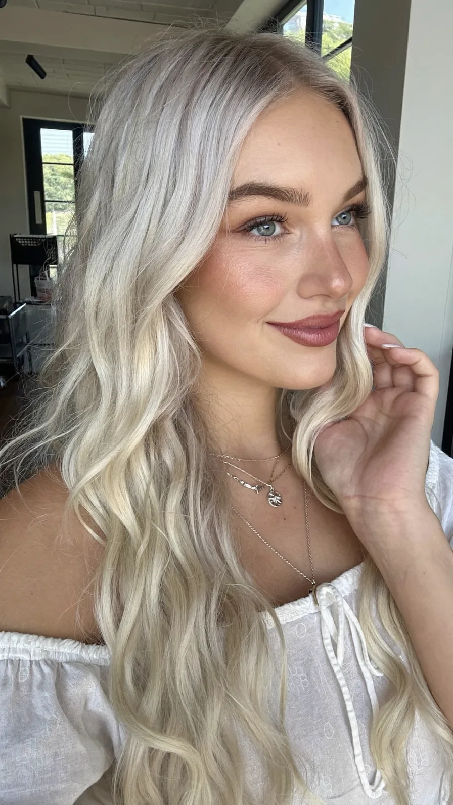 Platinum Blonde Long Layered Waves with Center Part