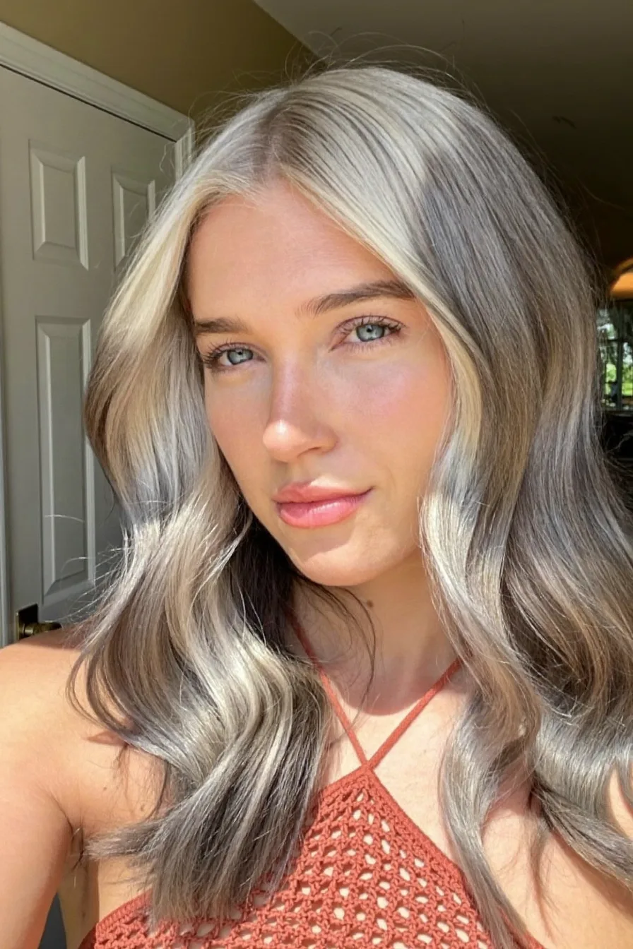 Soft Wavy Icy Blonde Medium-Length Layered Hairstyle